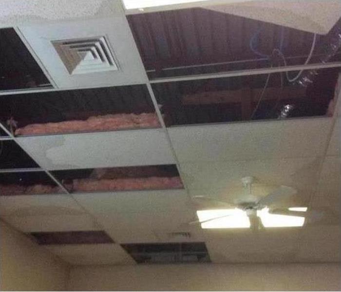 Ceiling tiles damaged by water